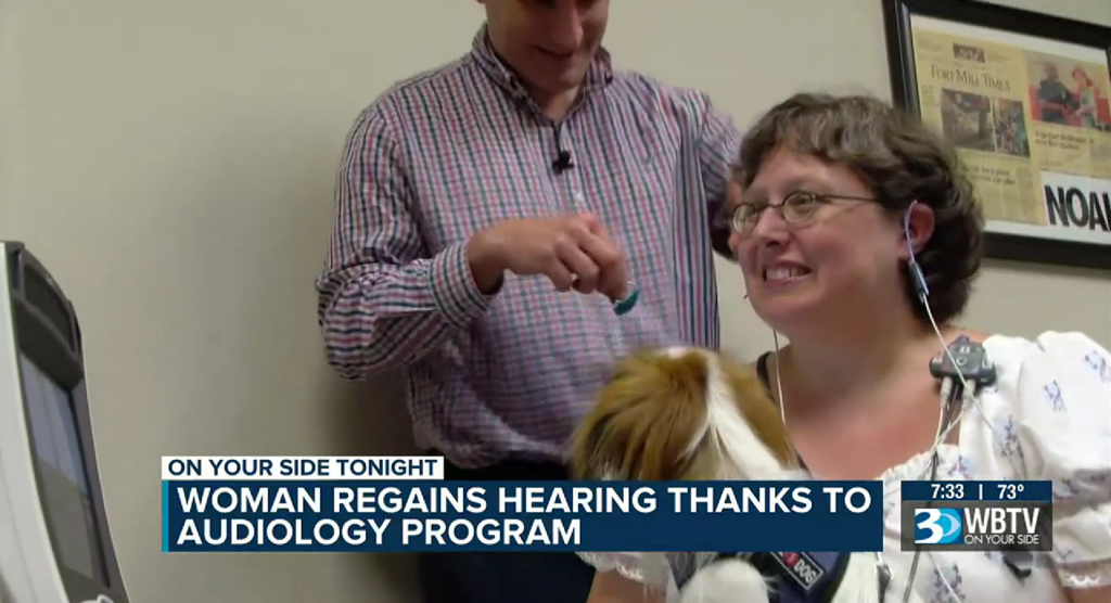 Woman getting her hearing aids